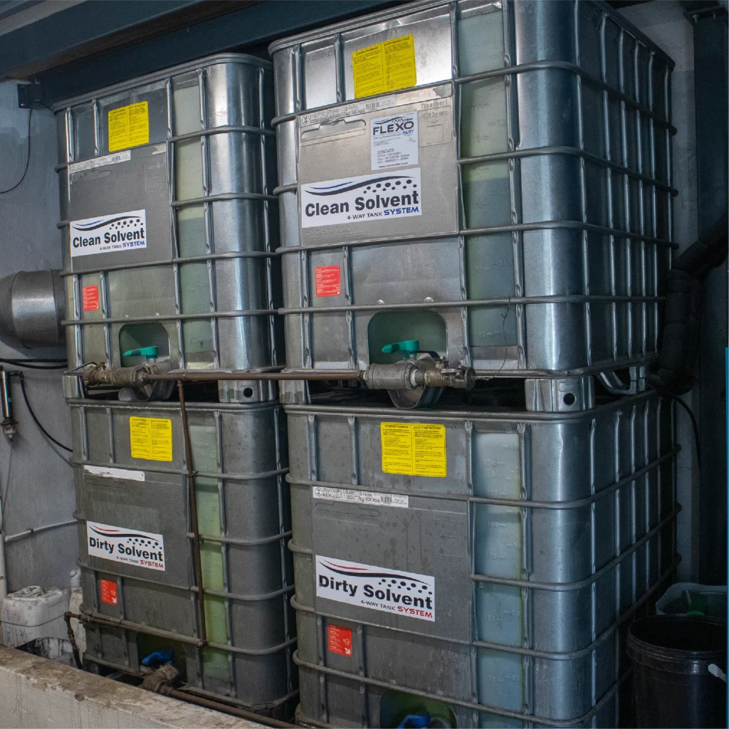 Solvent recovery system with clean solvent and dirty solvent IBC tanks